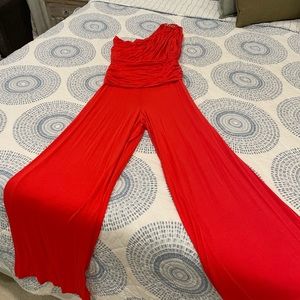 One shoulder one piece. Easy to put on and looks like a million bucks!